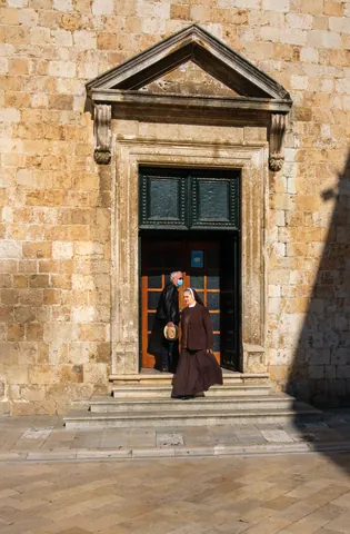 Nun outside Franciscan Monastery