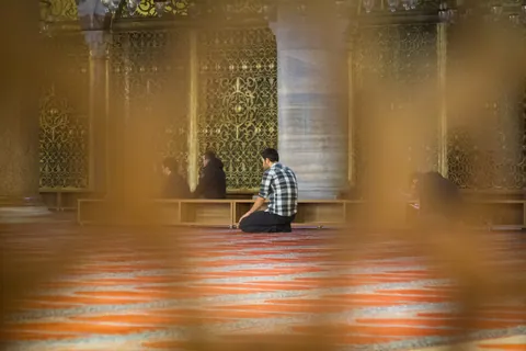 Worship at the Sulemaniye Mosque