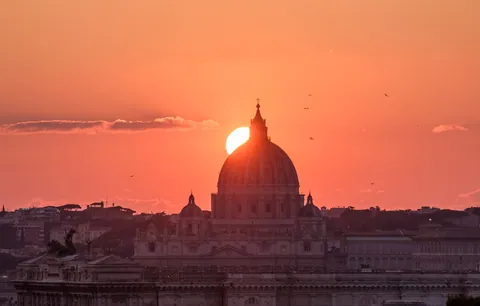 Sunset behind St Peter's Basilica