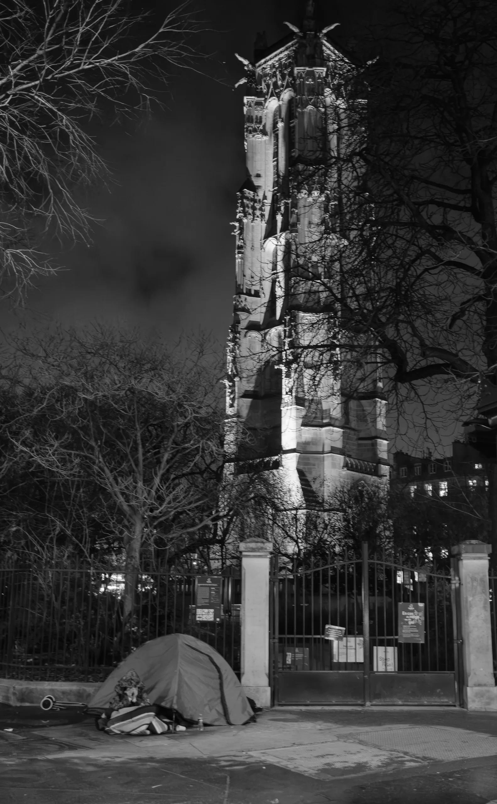 Tour Saint-Jacques and unhoused person