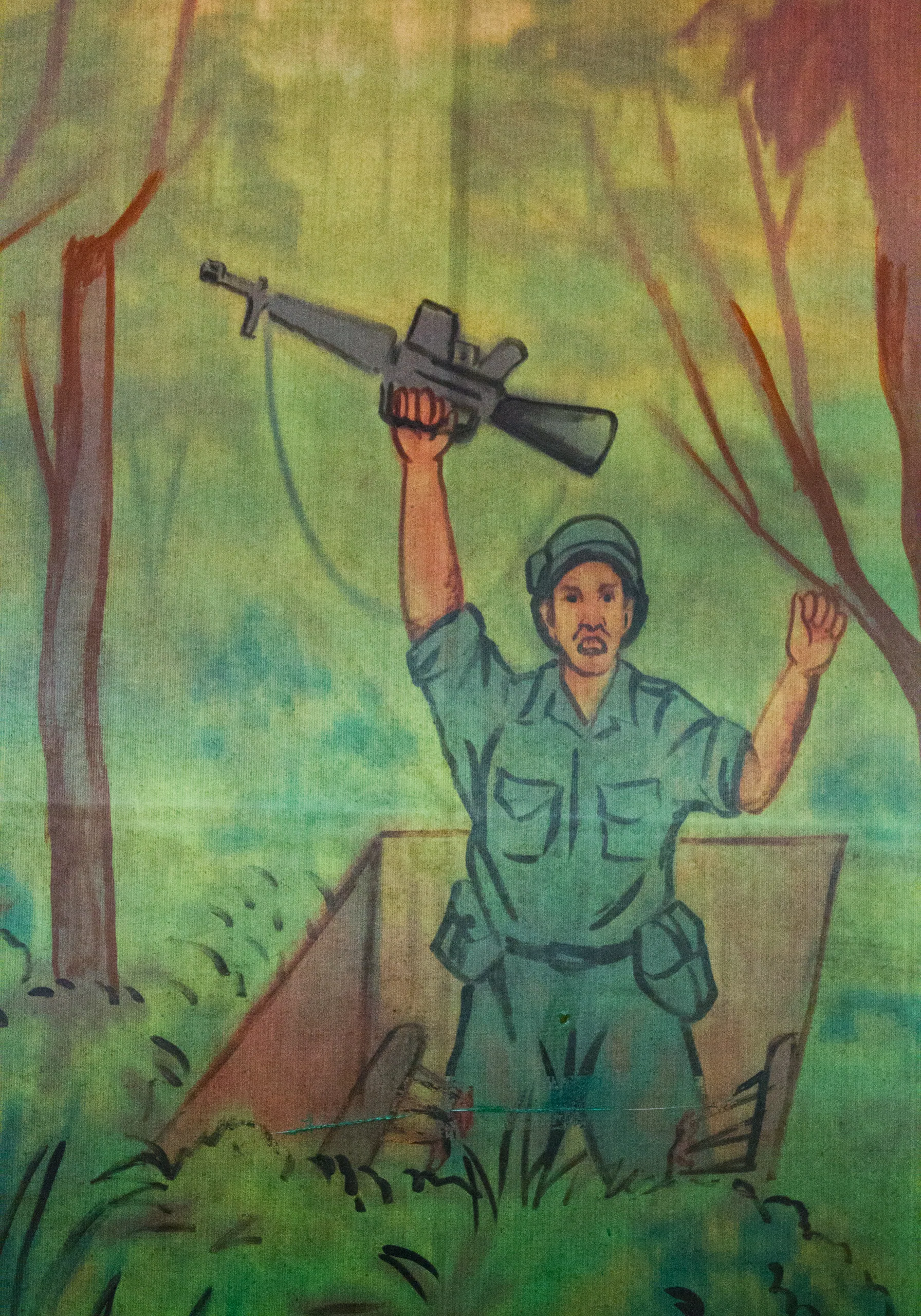 Cu Chi Tapestry of American Soldier falling into Trap