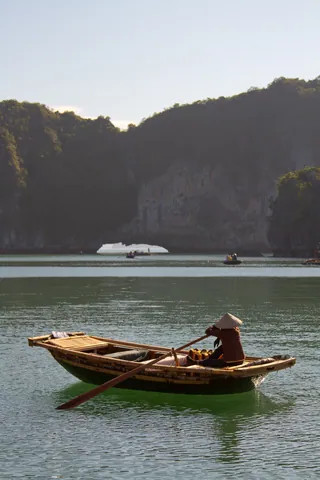 Lone fishing near Vong Vieng floating fishing village, Ha Long Bay