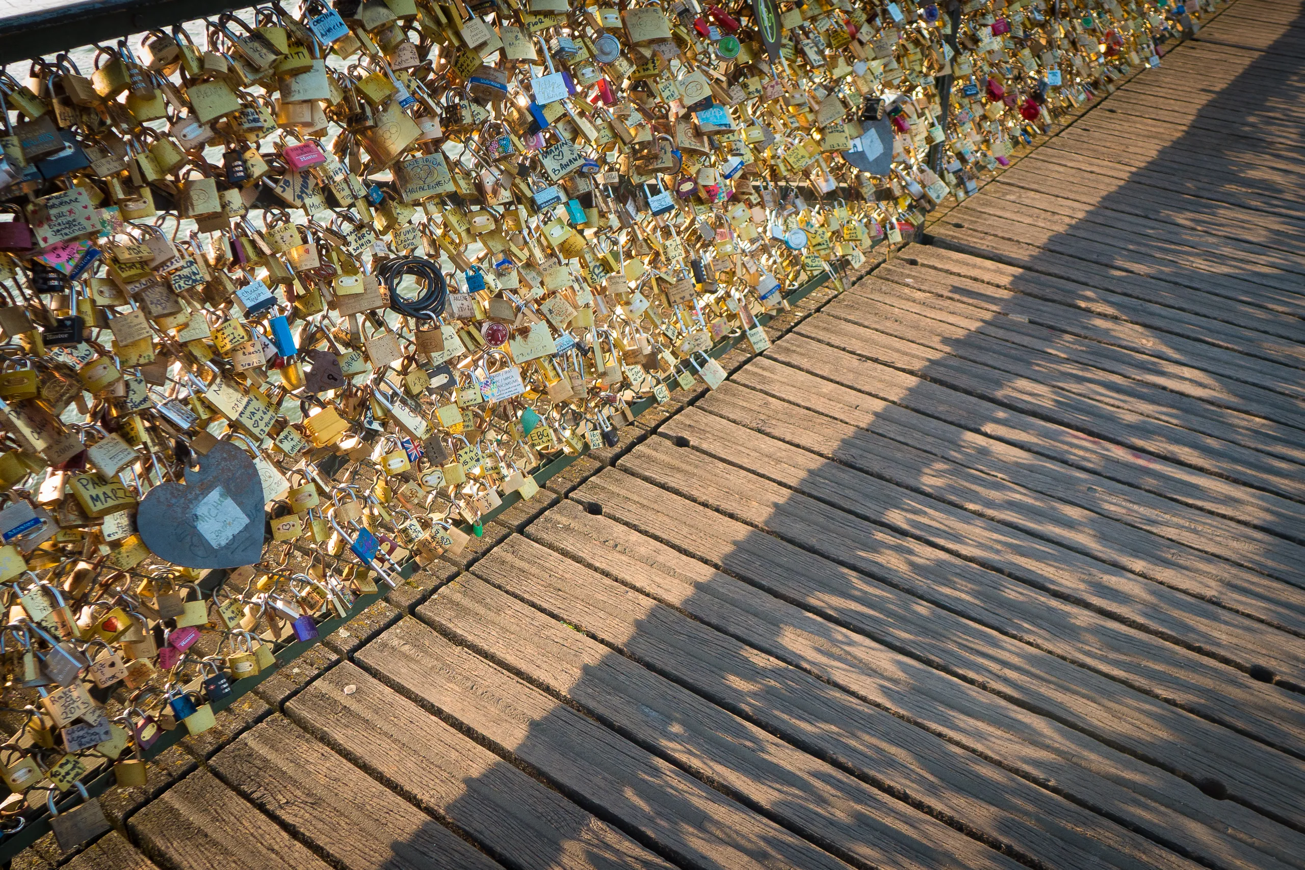 "Love Locks" and their shadows on the Pont Des Arts, Paris