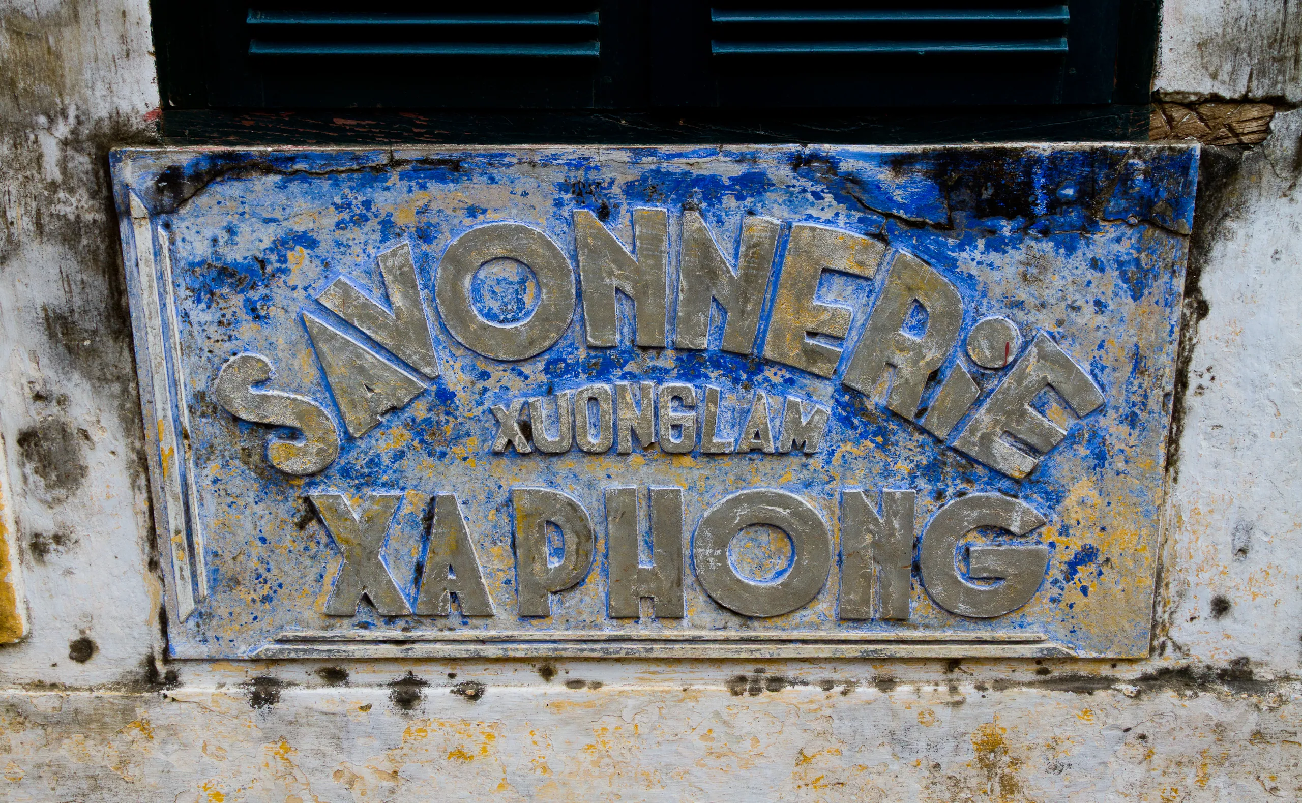 Old sign from the French Colonial days, Hoi An
