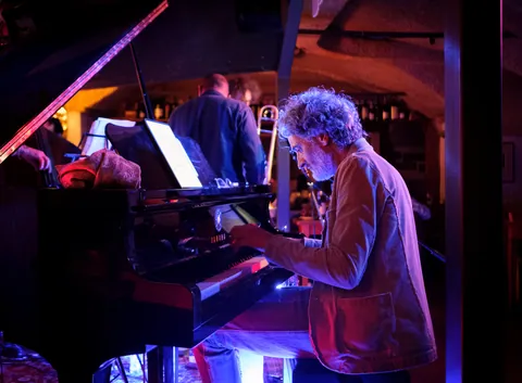 Jazz pianist at the cellar of the Cantina Bentivoglio, Bologna