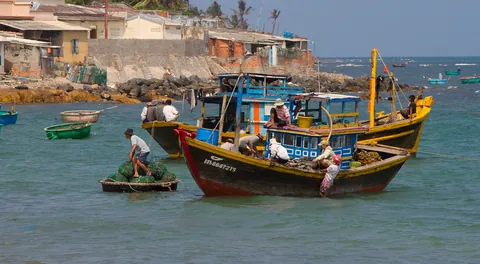 Fishermen on Phan Thiet Beach