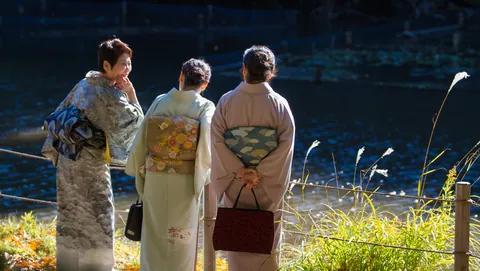 Kimono-clad women laughing together, Meiji Garden