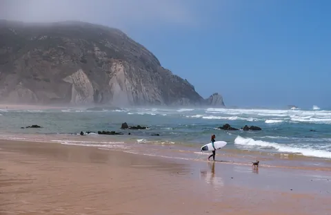 Castelejo Beach Surfer & Dog