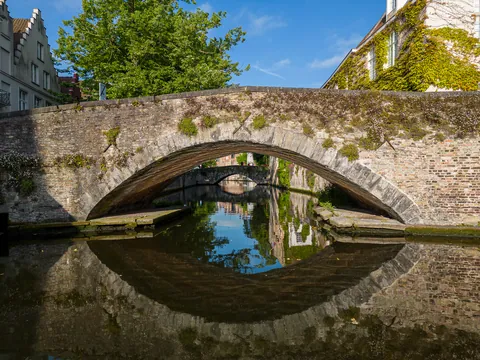 Bridge reflection, main canal, Bruges