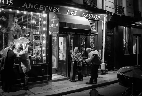 Catching up outside Nos Ancetres Les Gaulois, Ile-St-Louis