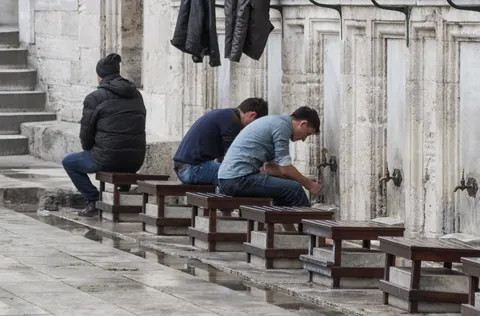 Ritual cleansing before prayer at the Sulemaniye Mosque
