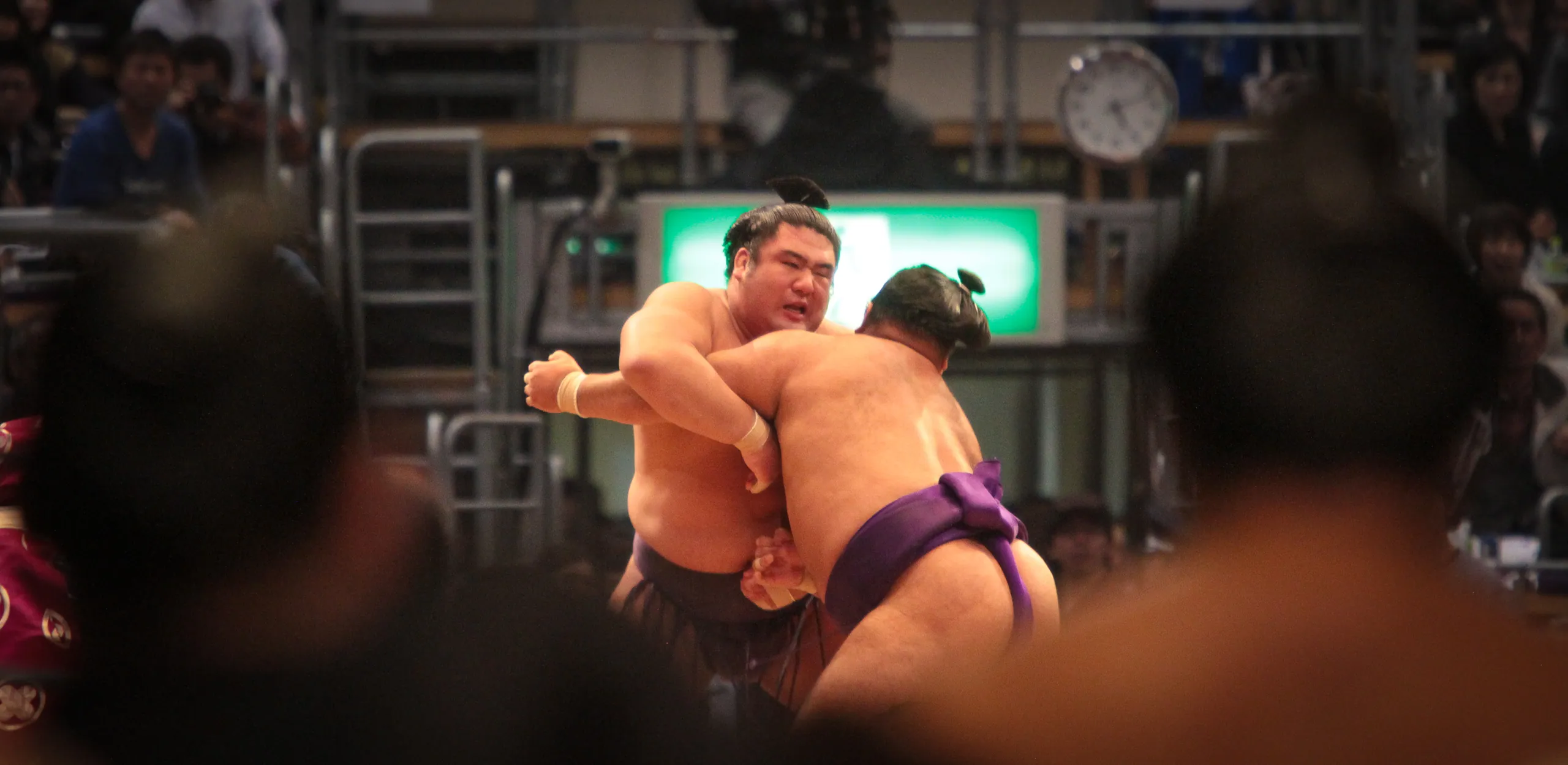Maku-uchi class sumo match viewed from the fighters' tunnel, Fukuoka Kokusai
