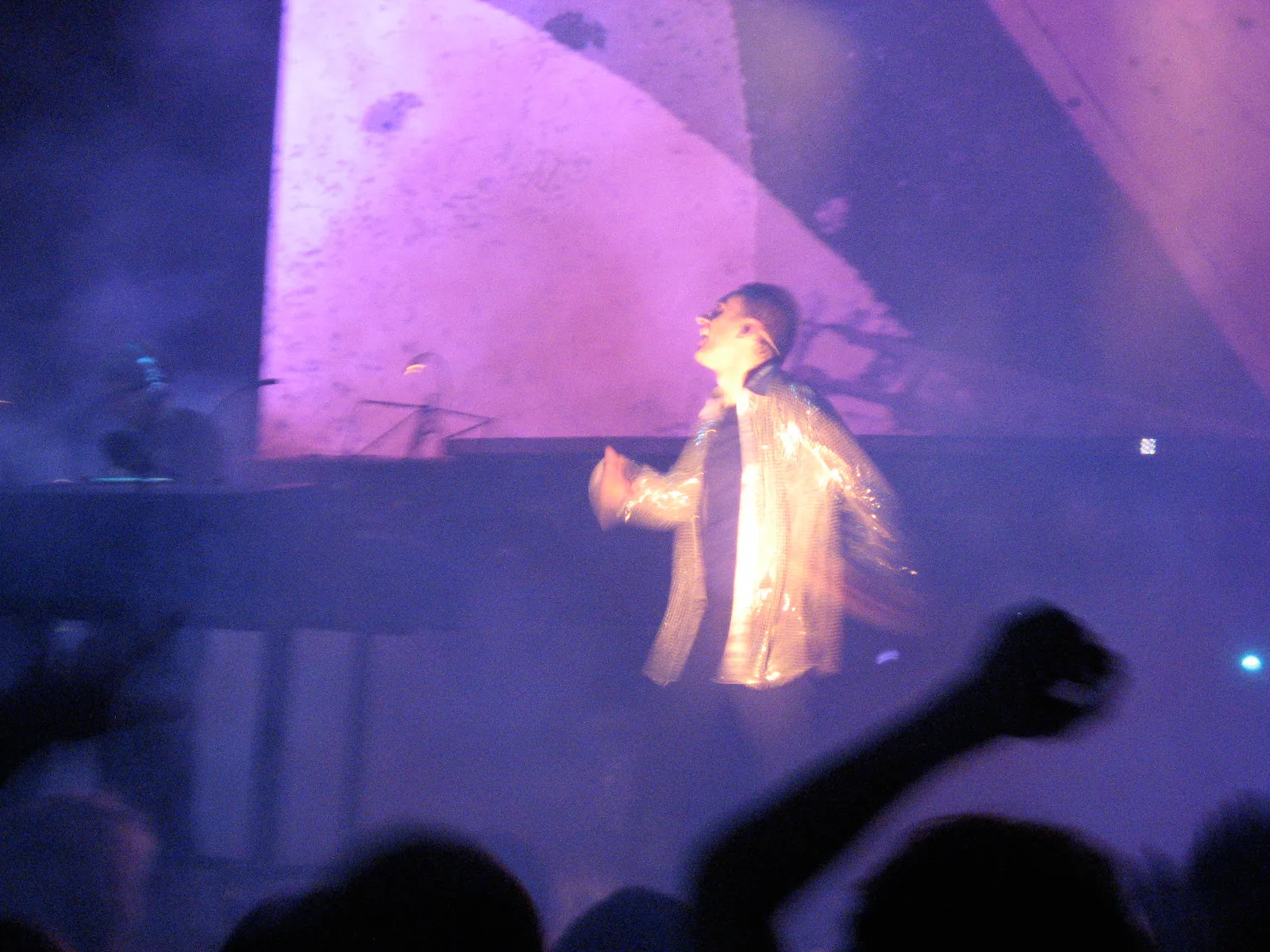 Karl Hyde in mid-dance