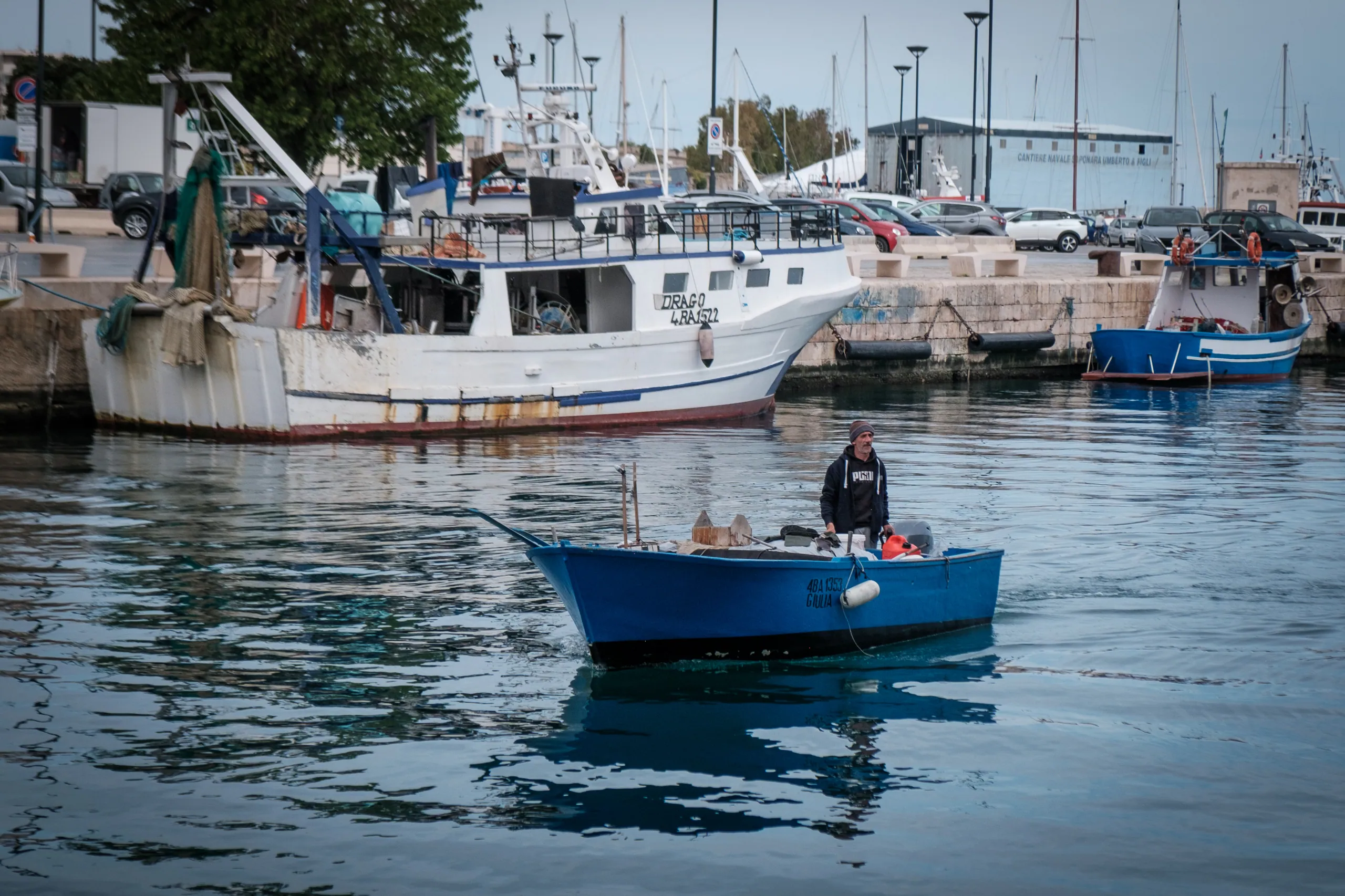 Fisherman in "Gozze" boat, Monopoli
