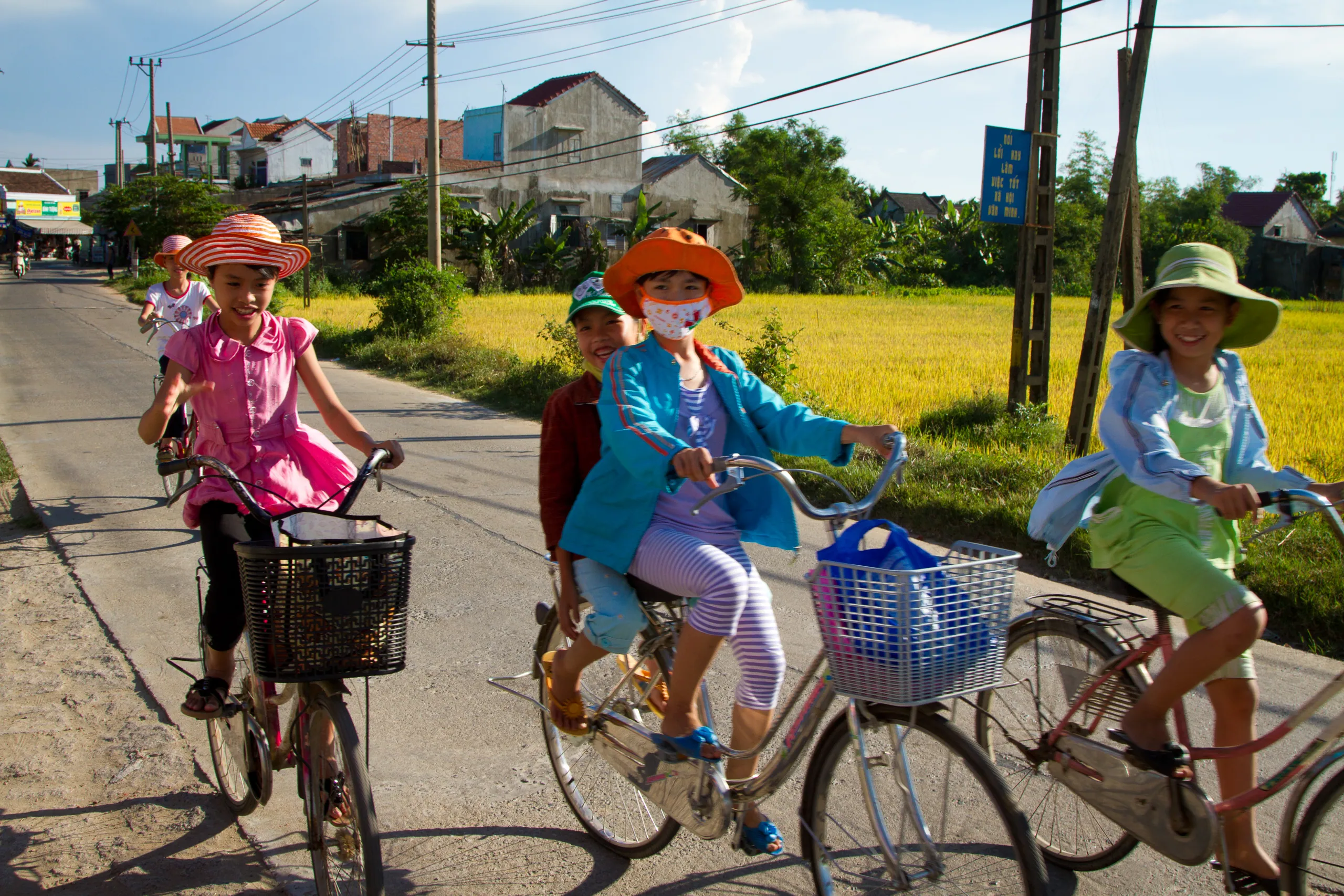 Bicycle kids, outside Hoi An