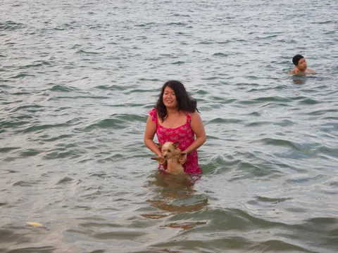 Bathing her best friend, Nha Trang Beach