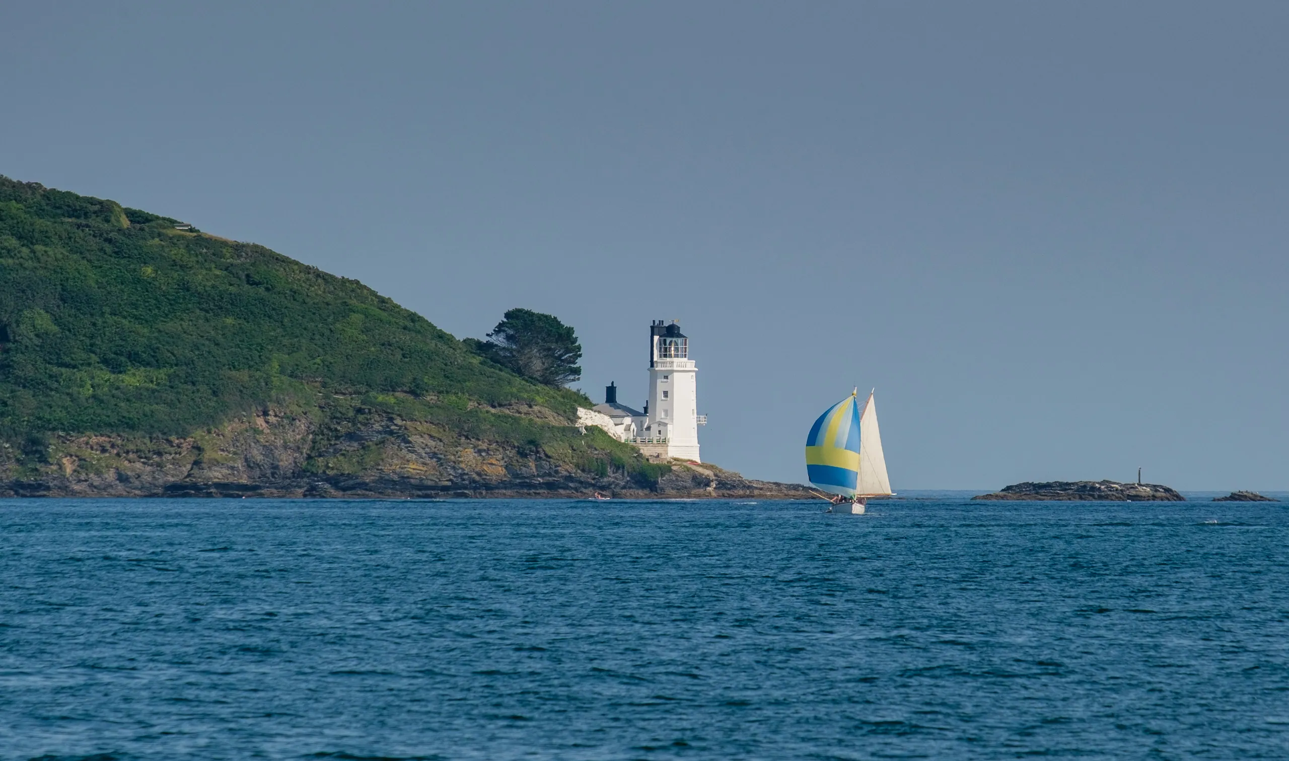 St Anthony Head Lighthouse and Sailboat