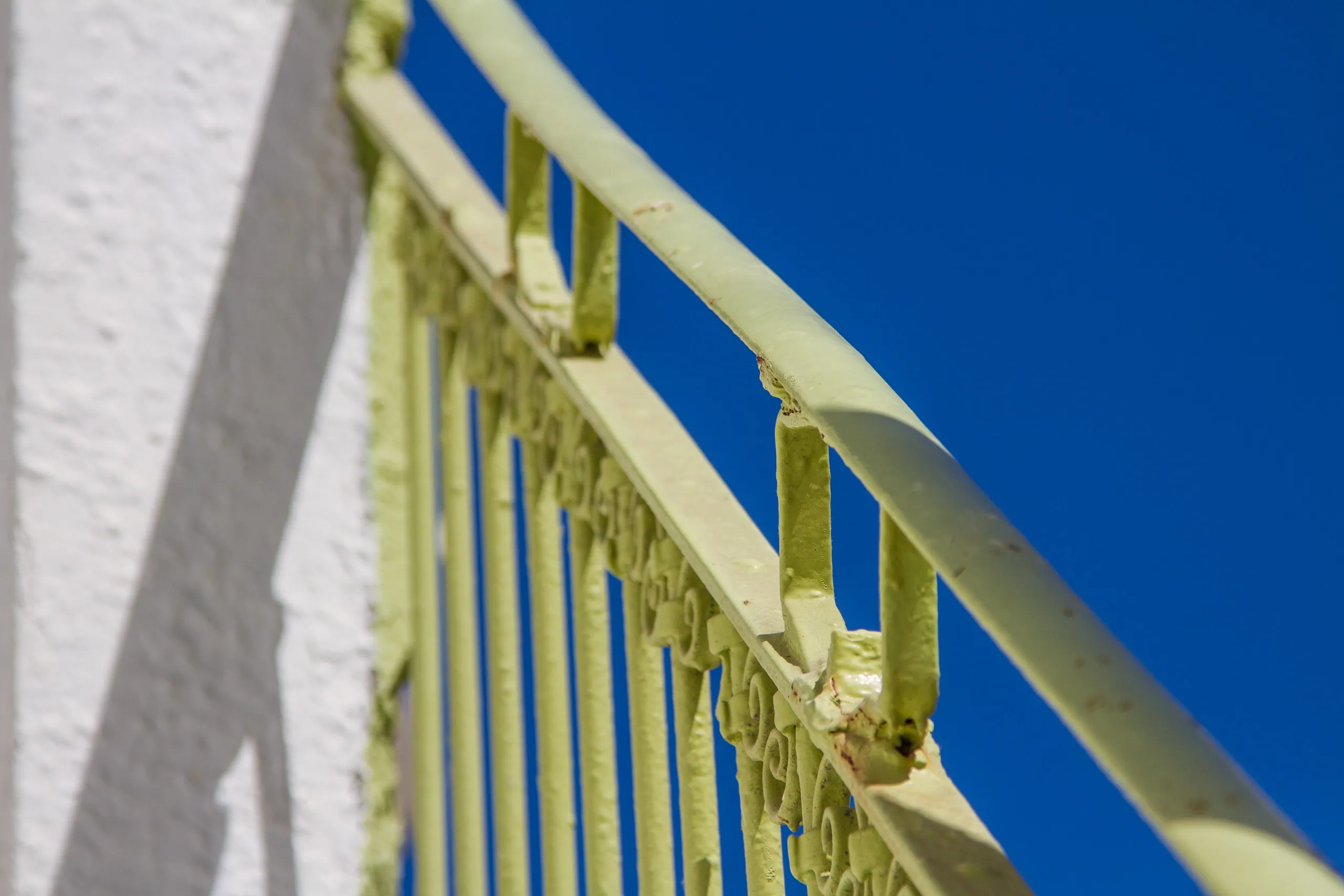 Railing and blue sky, Mykonos Town