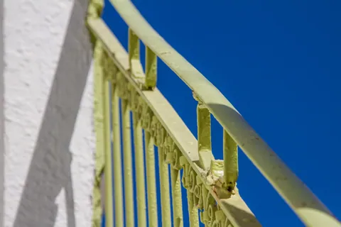 Railing and blue sky, Mykonos Town