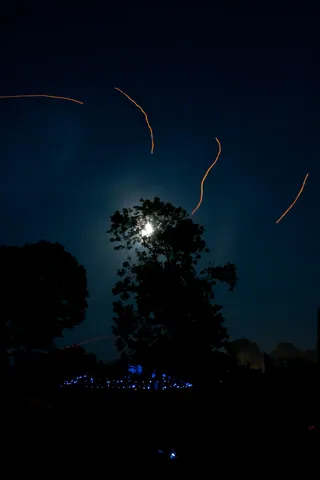 Moon and Light Trails of Fire Lanterns, Green Futures Field