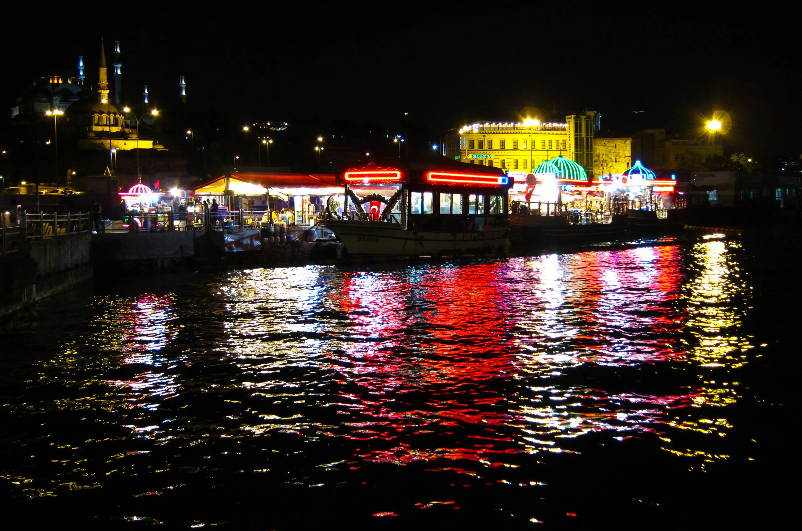 Fish Sandwich Boats reflected in the Golden Horn