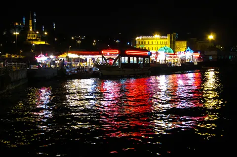 Fish Sandwich Boats reflected in the Golden Horn