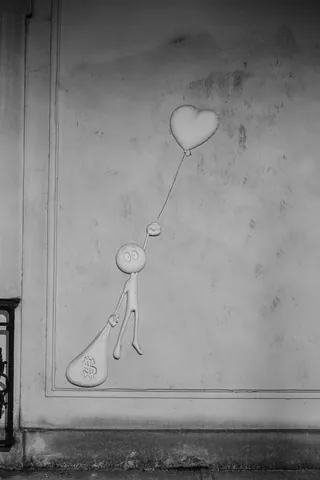 Montmartre street art: Love, or Money?