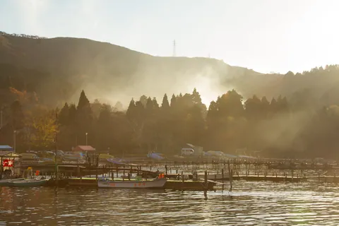 Geothermal steam and late afternoon sunshine on Lake Ashinoko