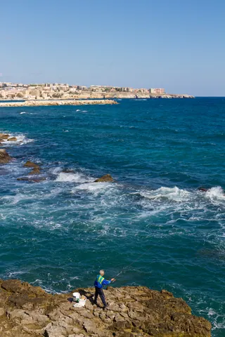 Lone fisherman, Ortigia