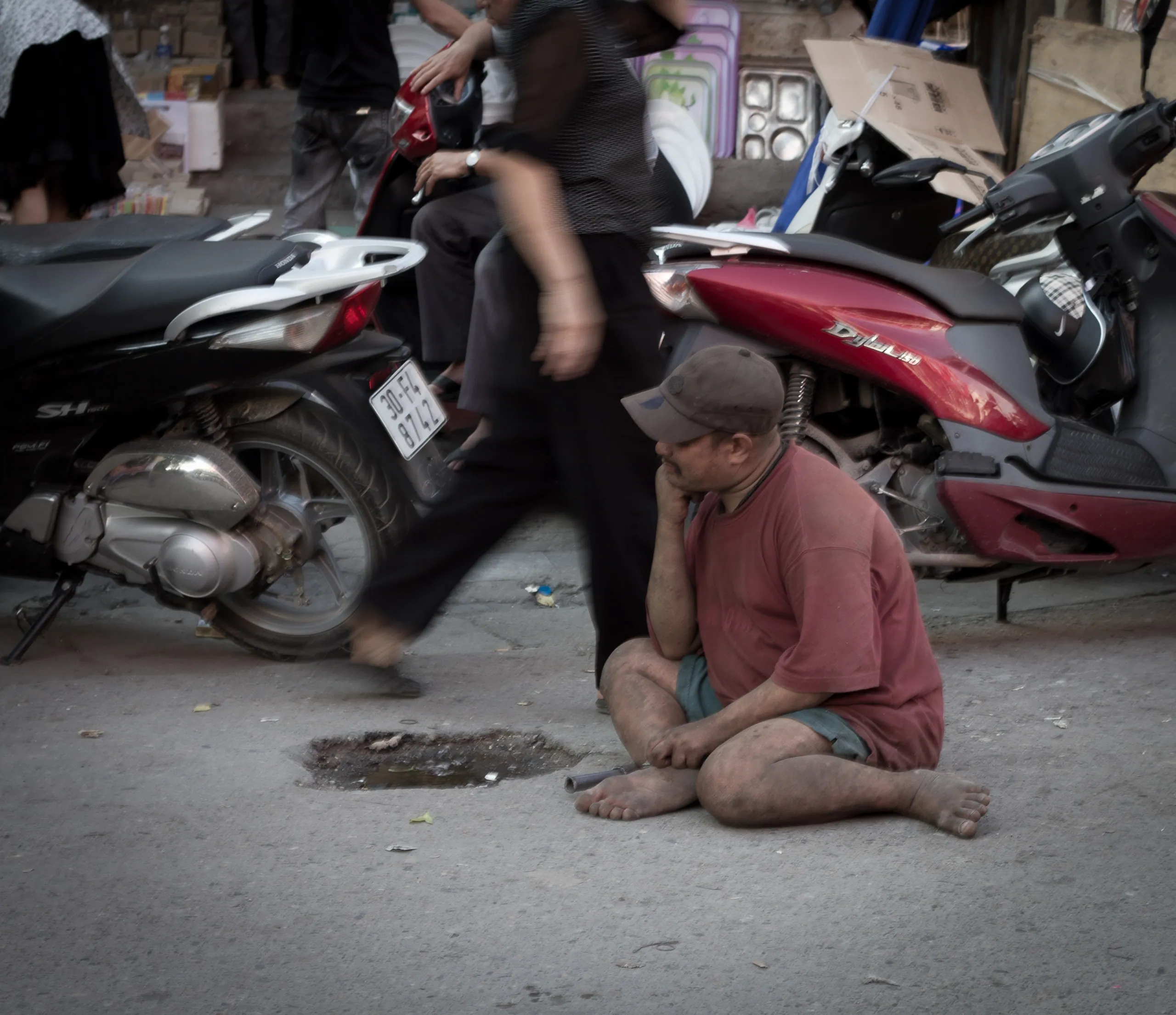 Homeless man, Old Quarter, Hanoi