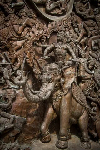 Bronze Miniature Statue in Wat Traimit Temple, Chinatown, Bangkok